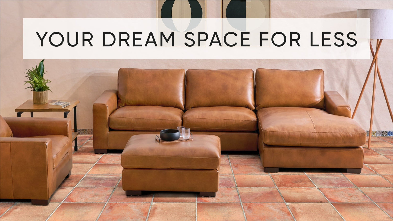 Brown leather sofa with chaise, matching chair and ottoman in living room with end table and tile flooring.